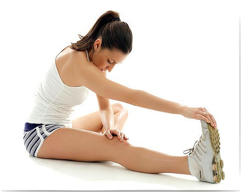 Woman doing leg stretches