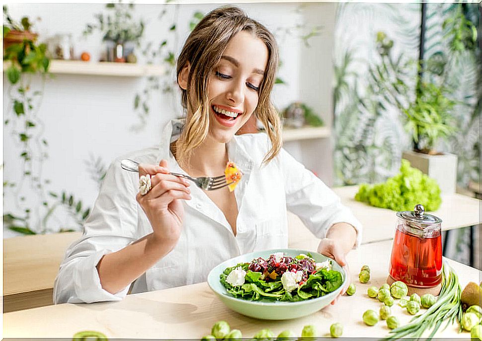 Woman eating a salad