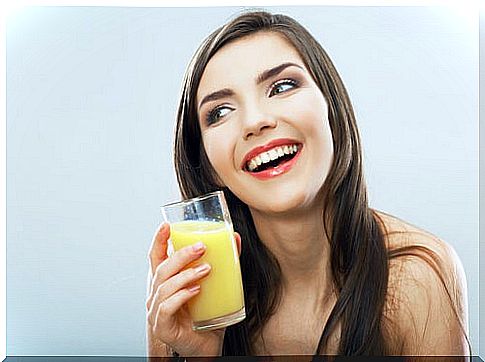 Woman using natural pineapple syrup for cough